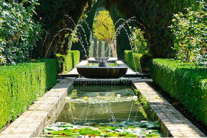 Guided tour to Alhambra with Generalife, Alcazaba and Carlos V - Stop 5: Palacio El Partal’s portico, pool, and garden punctuation