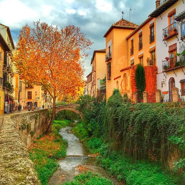 Tour Granada from its Origin; Albaicín - San Miguel Bajo and Santa Isabel la Real: stone faith and local stories